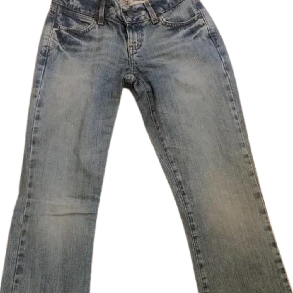 Rare Women’s Wrangler jeans with pink stitch.